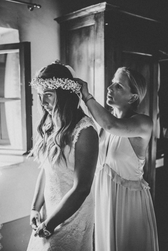 Checking the brides hair corsage