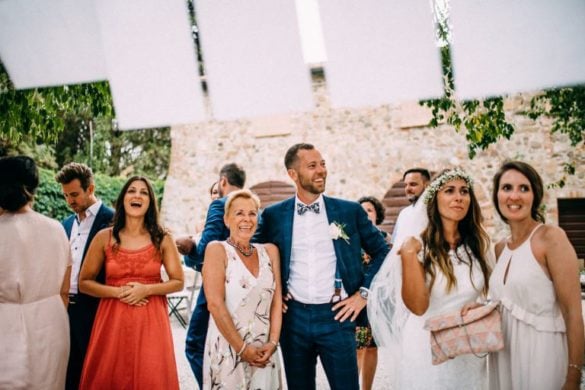 Wedding guests and spouses during bohemian themed party