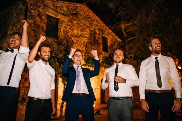 Friends of the groom ready to party at Tuscan borgo