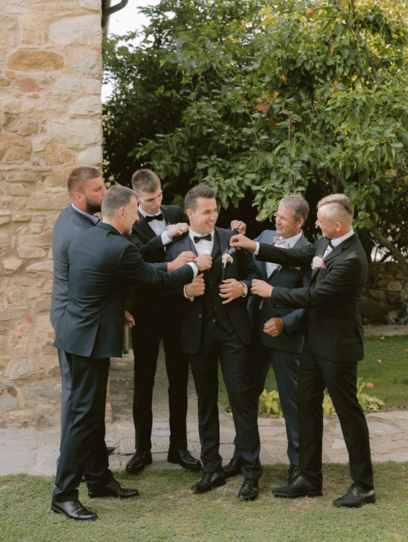 Groom and groomsmen having fun.