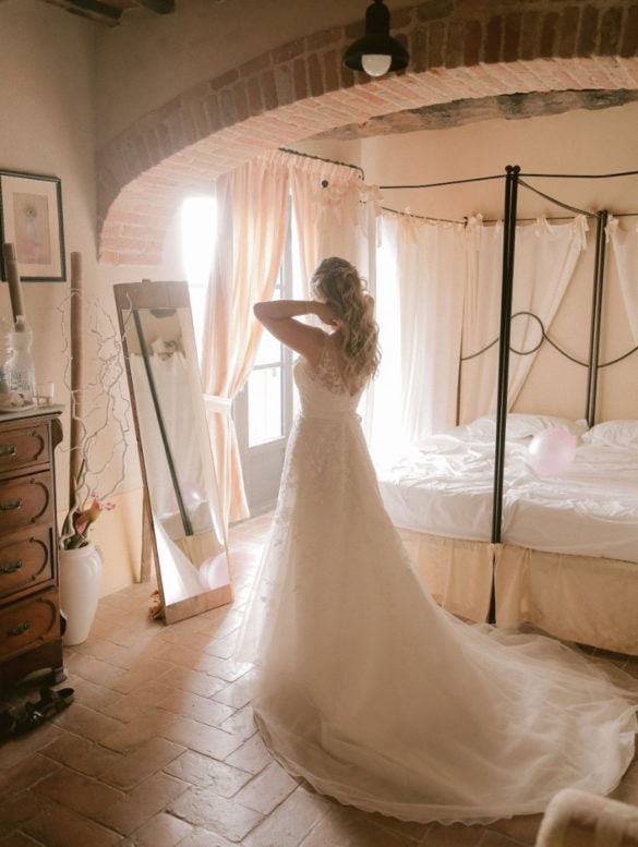 Bride getting ready in her room.