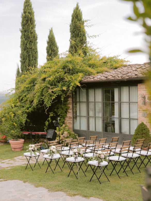 Romantic ceremony setup in the open air Tuscan hills.