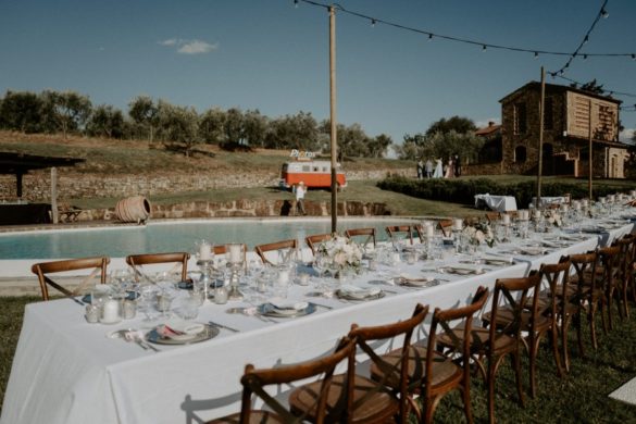 Stylish country chic wedding dinner table in Tuscan countryside