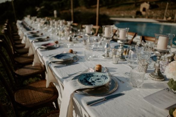 Chic rustic wedding dinner table pool side Chianti Tuscany