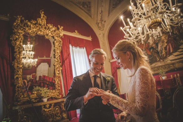 Ring exchange at gorgeous wedding hall Palazzo Vecchio Florence